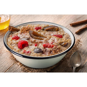 Lightweight Rice porridge with plum, raspberry and cinnamon